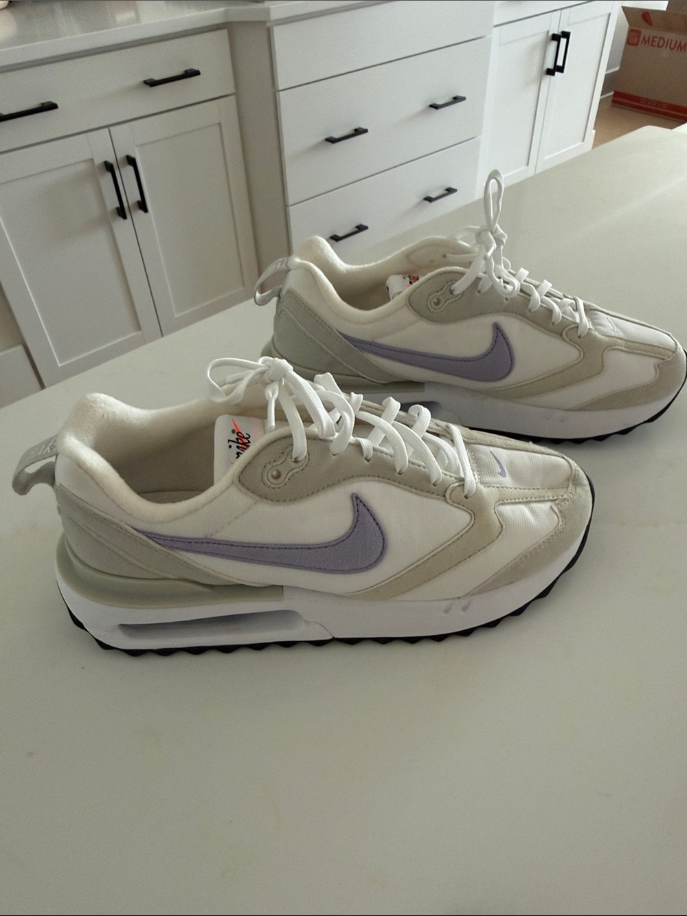 New without tags or box - Nike Women's sz 9 White with Lavender Swoosh